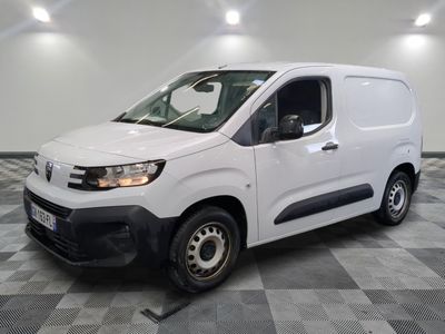 a picture of a white van parked on a checkered floor