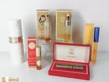 a lot of different types of perfumes on the table