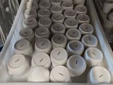 a tray with a lot of cups on top of it