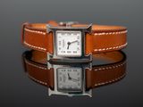 an image of a wrist watch with a leather band