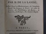 an open book with a black and white image of a bird on it
