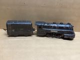 deux petits trains qui sont posés l'un à côté de l'autre