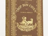 un vieux livre sur lequel figure l'image d'une femme assise sur un banc