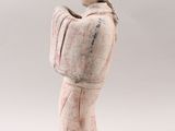 an image of a statue of a woman holding a vase
