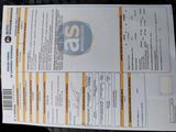 a picture of a passenger ticket with a picture of a train