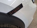 a close up of a sticker on the front of a car