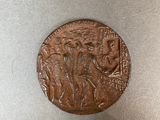 an image of a coin with a picture of a man and a woman on it