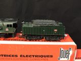 two toy trains sitting on top of a box