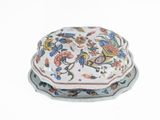 a white bowl with a floral design on it