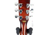 an image of a close up of a guitar neck on a white background