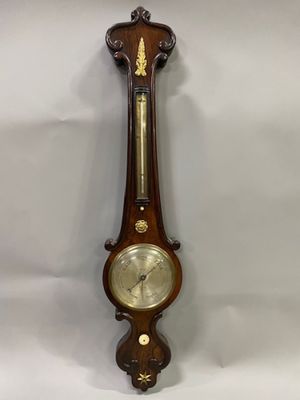 an old wooden grandfather clock hanging on the wall with a pendulum