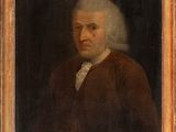 portrait of an old man in a brown coat and white hair