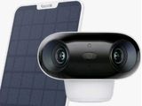 two cameras sitting next to each other on top of a white surface