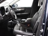 the interior of a car with black leather seats and a steering wheel