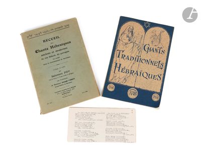 two books on a white table with a blue cover and an old book