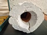 a white object that is sitting on top of a book