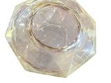 an image of a clear glass ashtray on a white background