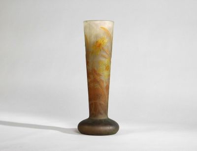a glass vase that is sitting on a table