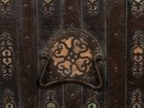 a close up of a door with a decorative design on it