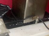an image of a kitchen with a toaster and a bag on the counter