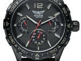 a close up of a wrist watch with a black face and red hands