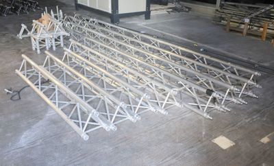 a large metal structure that is being constructed in a warehouse