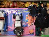 a cardboard box with a bunch of toys in it