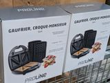 two boxes of food sitting on top of a metal rack