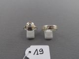 deux bagues en argent et une bague sertie d'un diamant