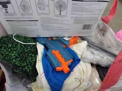 a box with a bunch of nerf guns inside of it