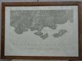 une vieille carte de la ville de New York dans un cadre en bois