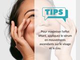 the woman is holding her hand up to her face with a speech bubble above her head