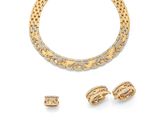 un collier, un bracelet et une bague en or et diamants