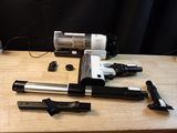 a picture of a pair of tools on a wooden table