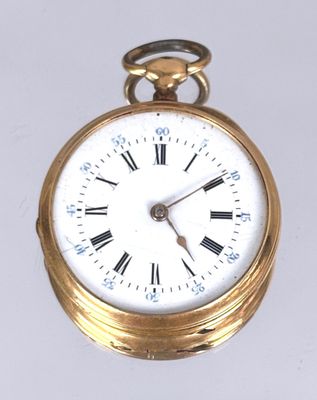 a gold pocket watch with roman numerals on the face