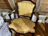a chair that is sitting in the corner of a room