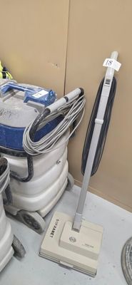 a blue and white vacuum and a blue and white bucket and a blue and white vacuum