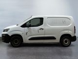 a white van that is parked in a room