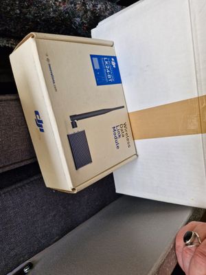 a person holding a box that is open on the stairs