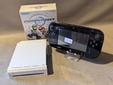 Console de jeux Nintendo Wii avec les jeux Mario Kart et Mario Kart Wii