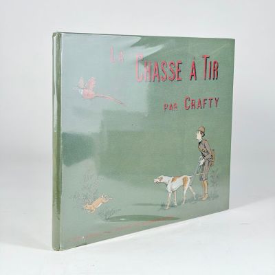 a book with a picture of a man and a dog on it