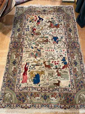 an oriental rug on the floor in a living room