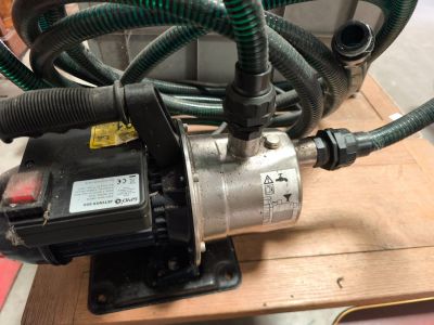 a picture of a pump with a hose attached to it
