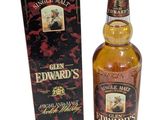 une photo d'une bouteille de whisky « Edward » à côté d'une boîte