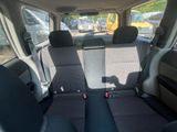 two seats in the back of a car that are empty