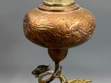 a statue of an elephant and a bird on a pedestal