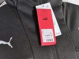 a close up of a puma jacket on a mannequin mannequin mannequin mannequin mannequin mannequin mannequin mann