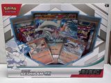 une boîte de cartes pokemon posée sur une table