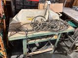 a table with a bunch of wires on top of it