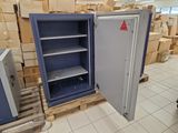 a metal cabinet that is open on a pallet